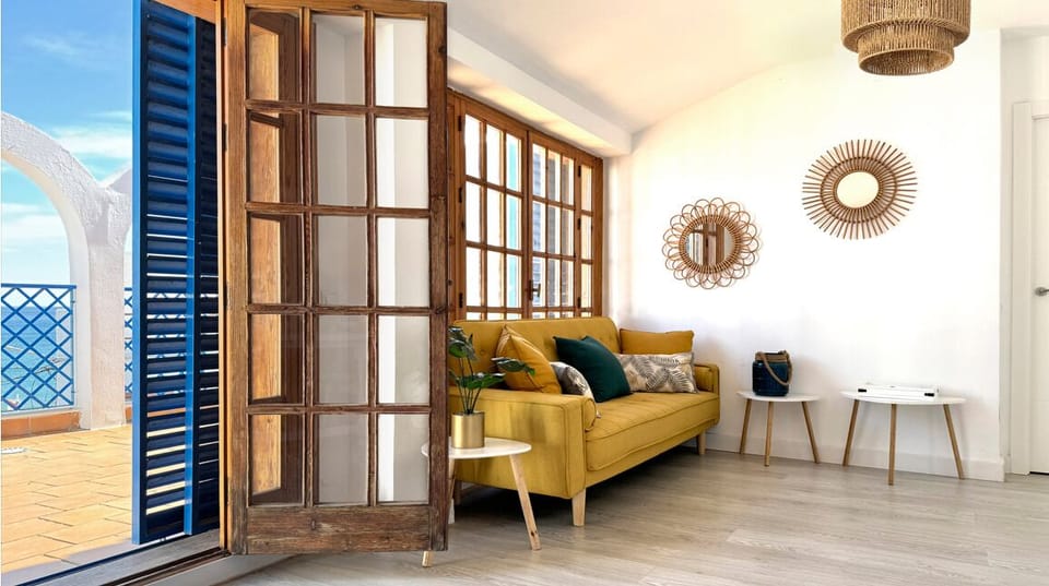 Deluxe Apartment, Sea View | Living area | TV