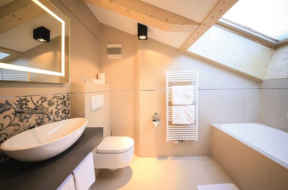 Deluxe Quadruple Room, Mountain View | Bathroom | Free toiletries, hair dryer, bathrobes, slippers