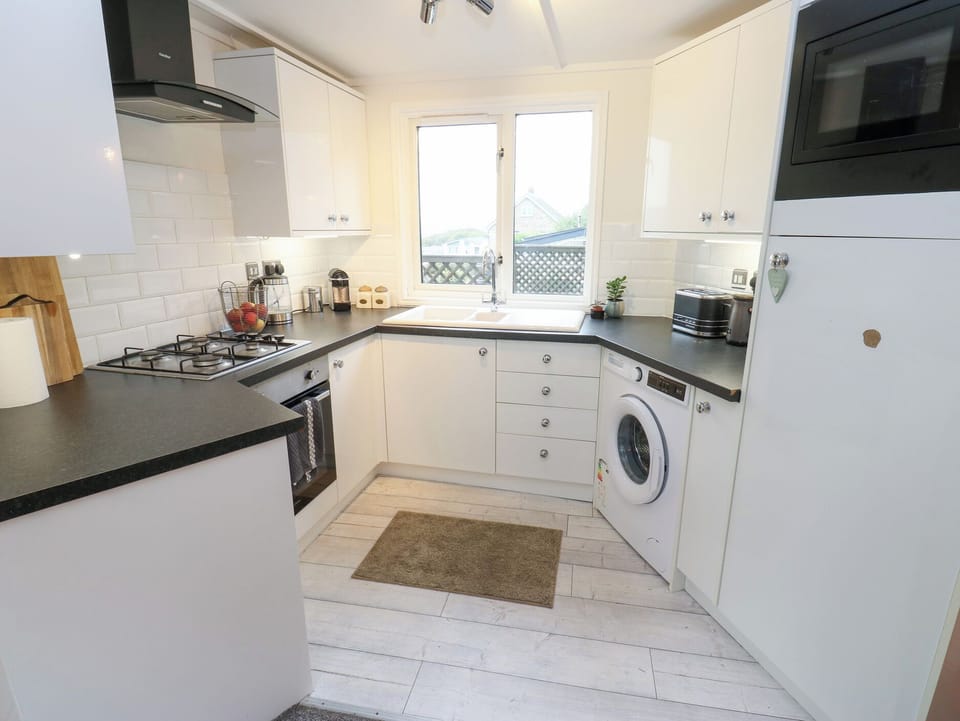 Fridge, microwave, toaster, cookware/dishes/utensils