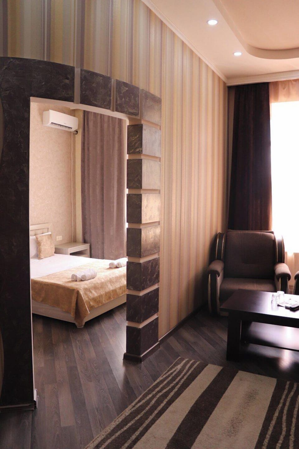 Deluxe Double Room, Courtyard View | Desk, laptop workspace, soundproofing, iron/ironing board