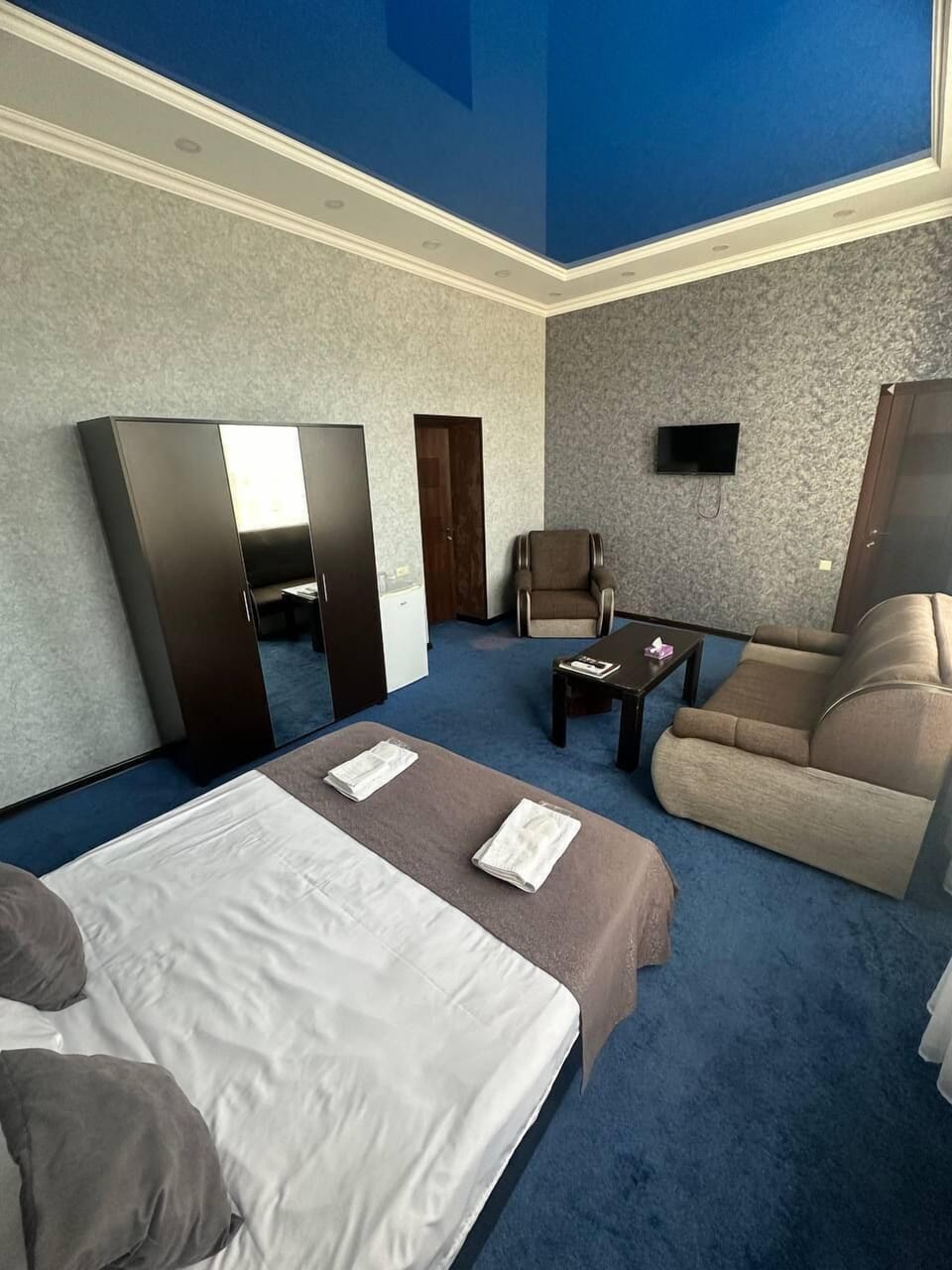 Deluxe Double Room, Courtyard View | Desk, laptop workspace, soundproofing, iron/ironing board