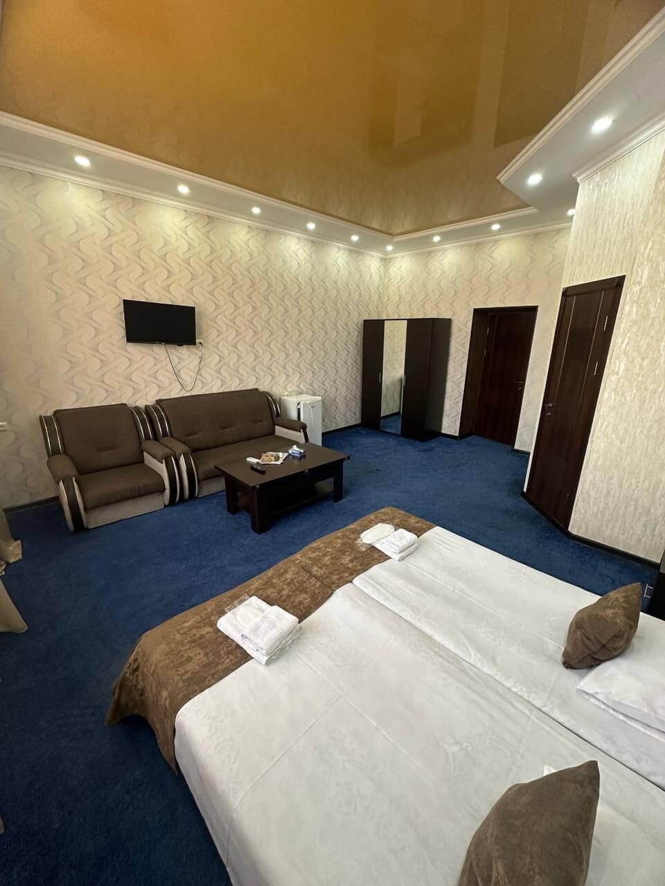 Deluxe Double Room, Courtyard View | Desk, laptop workspace, soundproofing, iron/ironing board