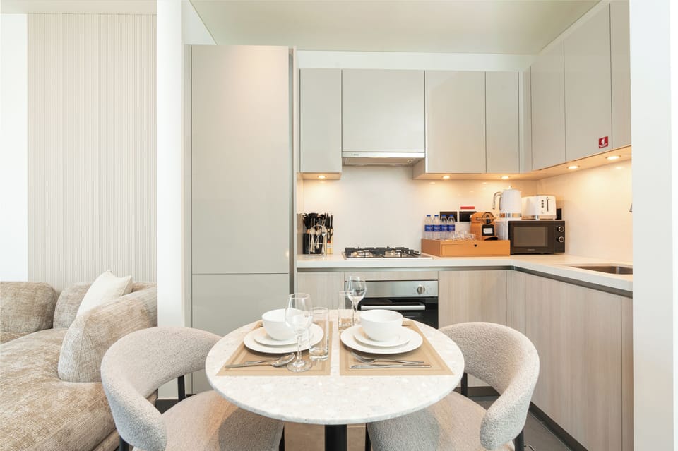 Design Apartment, Balcony, City View | In-room dining