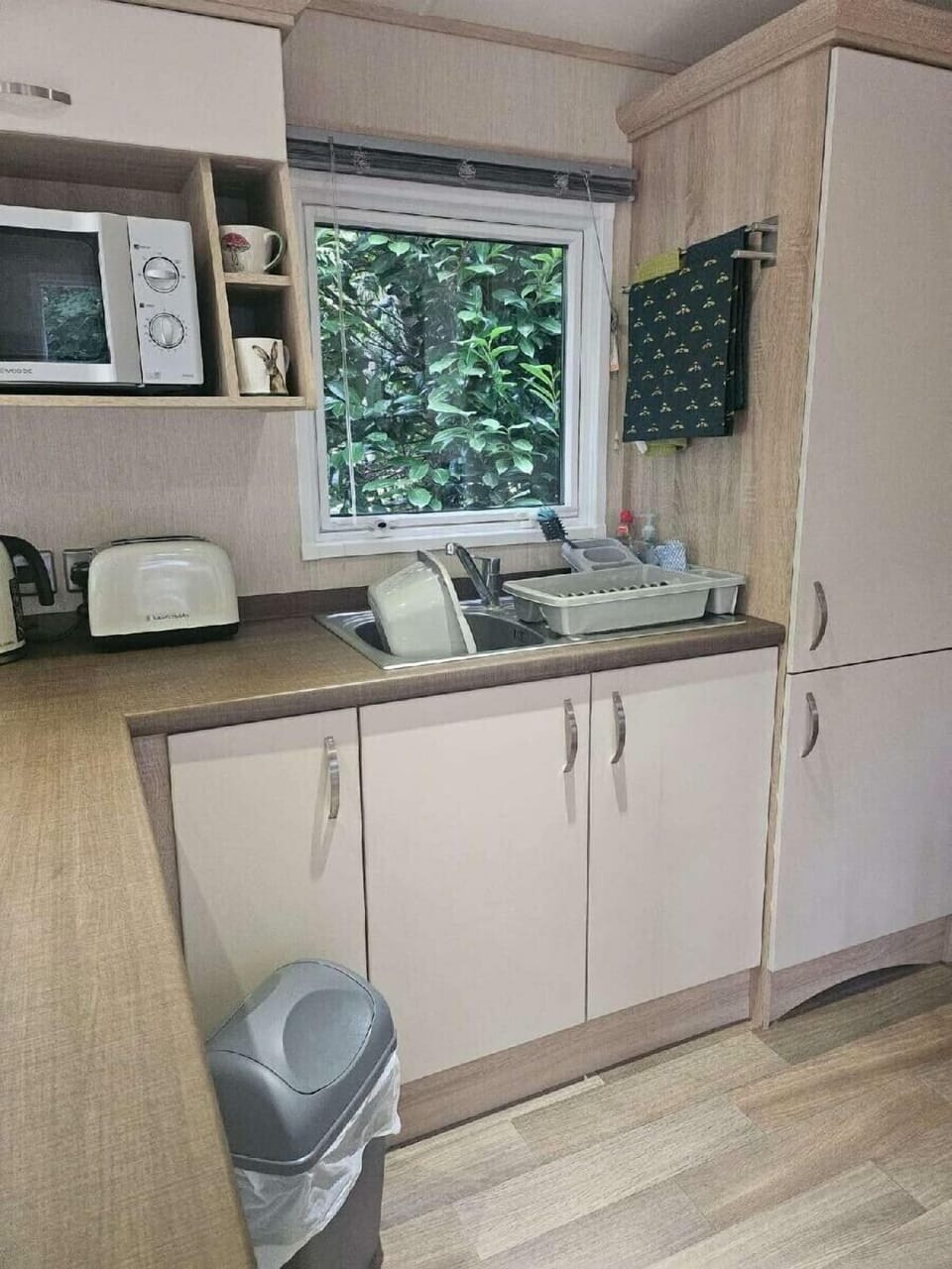Fridge, microwave, toaster, cookware/dishes/utensils