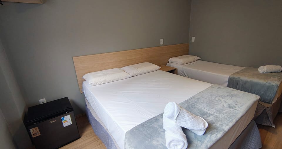 Standard Room | Laptop workspace, bed sheets
