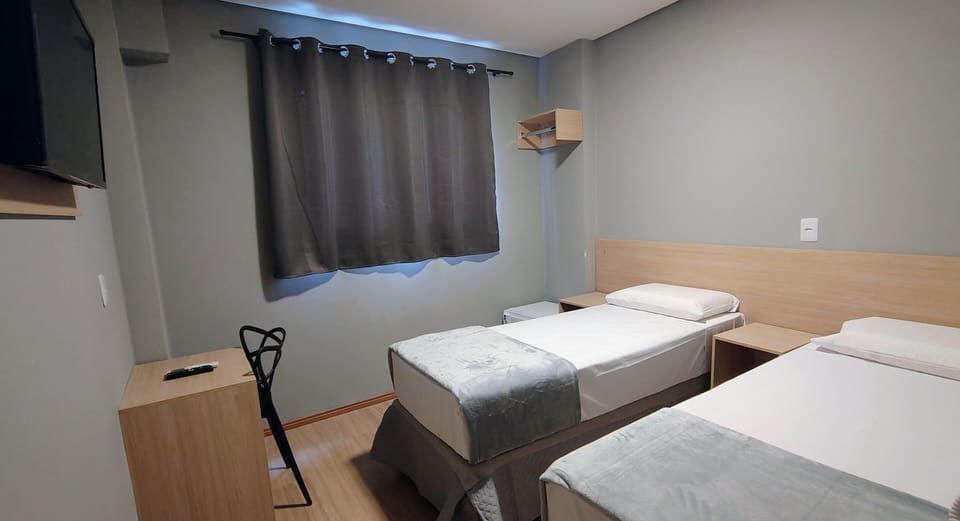 Standard Double or Twin Room | Laptop workspace, bed sheets