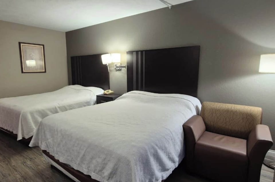 Room, 2 Queen Beds, Non Smoking | Iron/ironing board, free WiFi, bed sheets