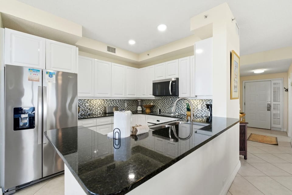 Condo, Multiple Beds (Beach Colony East 12D) | Private kitchen | Oven, toaster