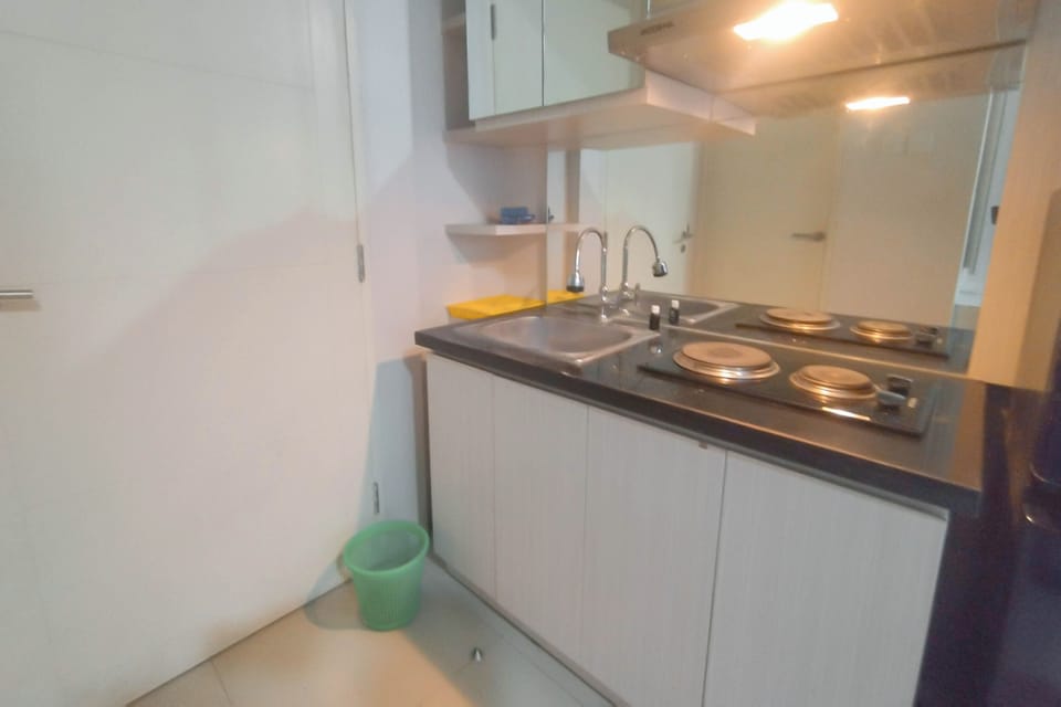 Apartment | Private kitchen | Fridge, stovetop, cookware/dishes/utensils