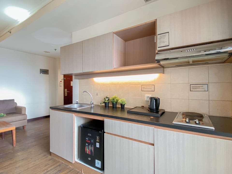 Apartment | Private kitchen | Fridge, stovetop, cookware/dishes/utensils