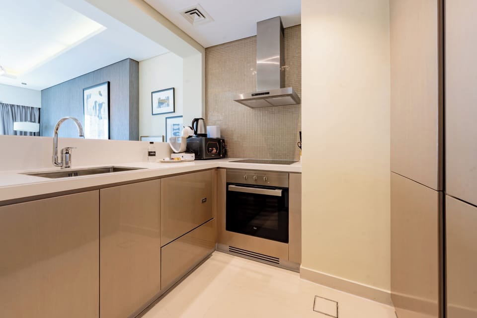 Deluxe Apartment, Balcony, City View | Private kitchen | Espresso maker, electric kettle
