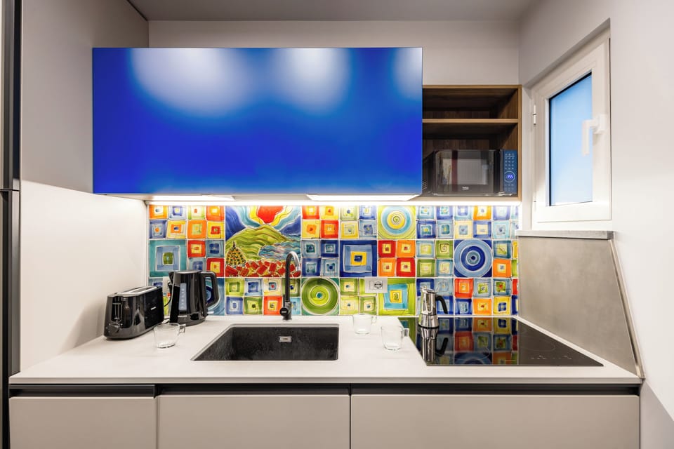 Apartment, 1 Queen Bed with Sofa bed, Balcony | Private kitchen | Fridge, microwave, stovetop, dishwasher