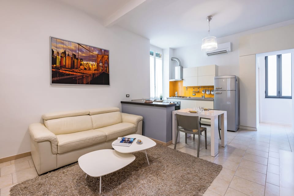 Apartment, 1 Queen Bed with Sofa bed | Living area | 30-inch TV with satellite channels