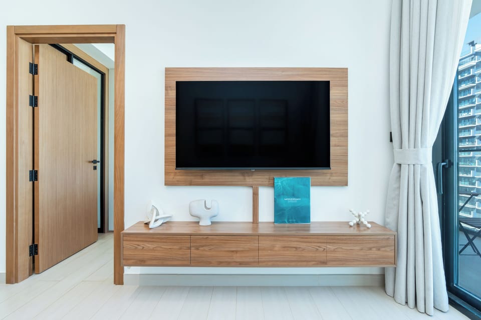 Premium Apartment, Balcony, City View | Living room | 55-inch Smart TV with digital channels