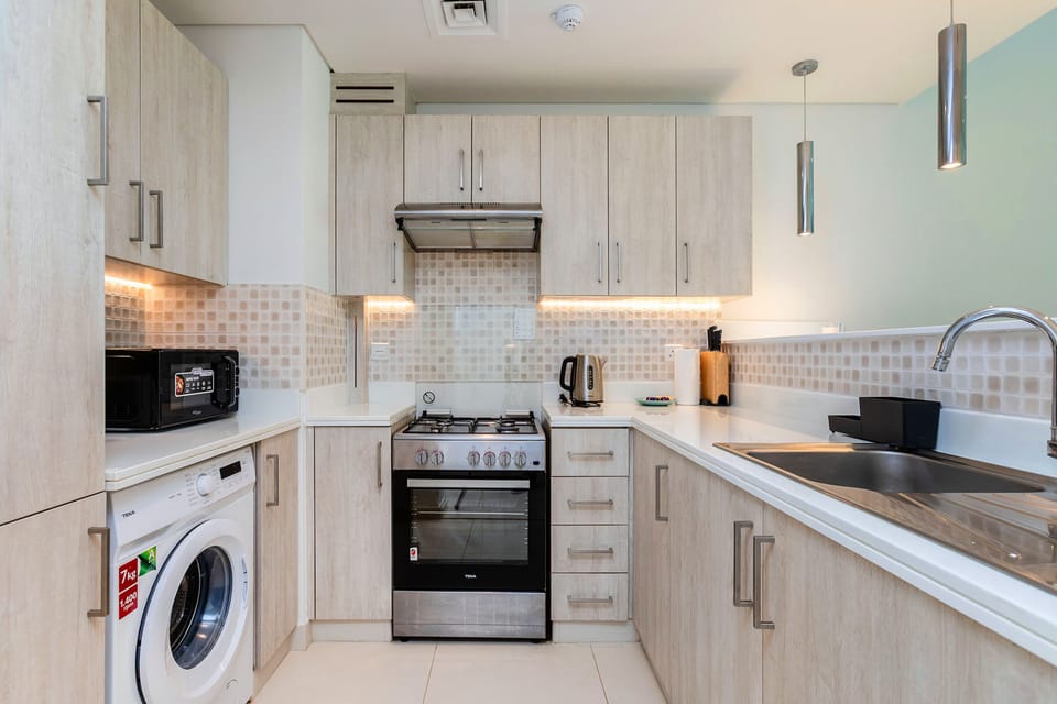 Superior Apartment, 1 Bedroom, Sea View | Private kitchen | Espresso maker, electric kettle, toaster, freezer