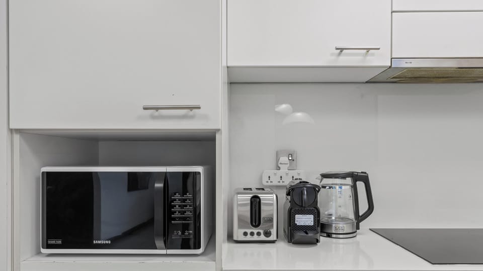 Standard Apartment, Sea View | Private kitchen | Full-size fridge, microwave, oven, stovetop