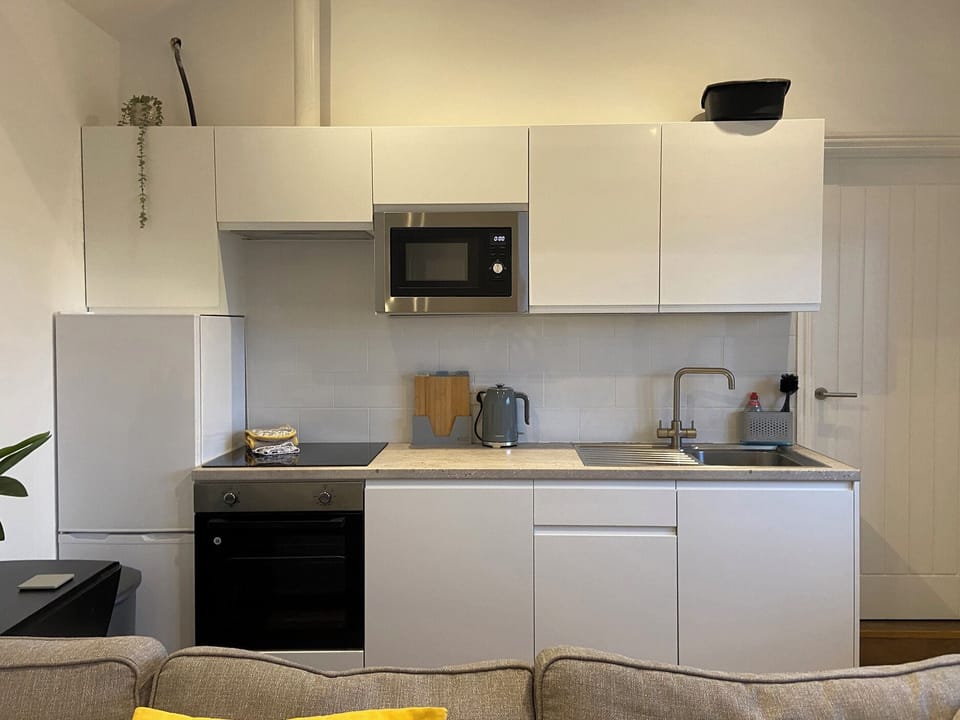Fridge, microwave, cookware/dishes/utensils