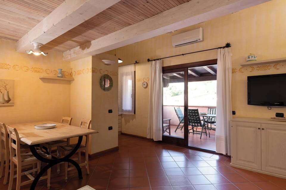 Apartment, 2 Bedrooms | Living area | 30-inch TV with satellite channels