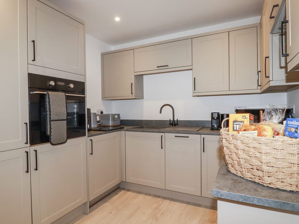 Fridge, microwave, toaster, cookware/dishes/utensils