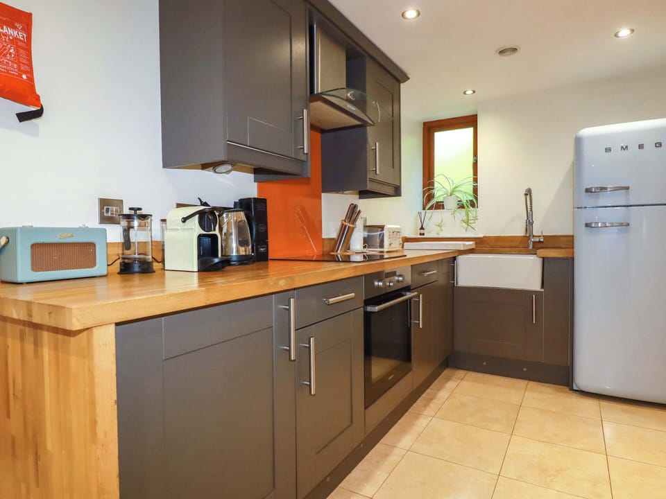 Fridge, microwave, cookware/dishes/utensils
