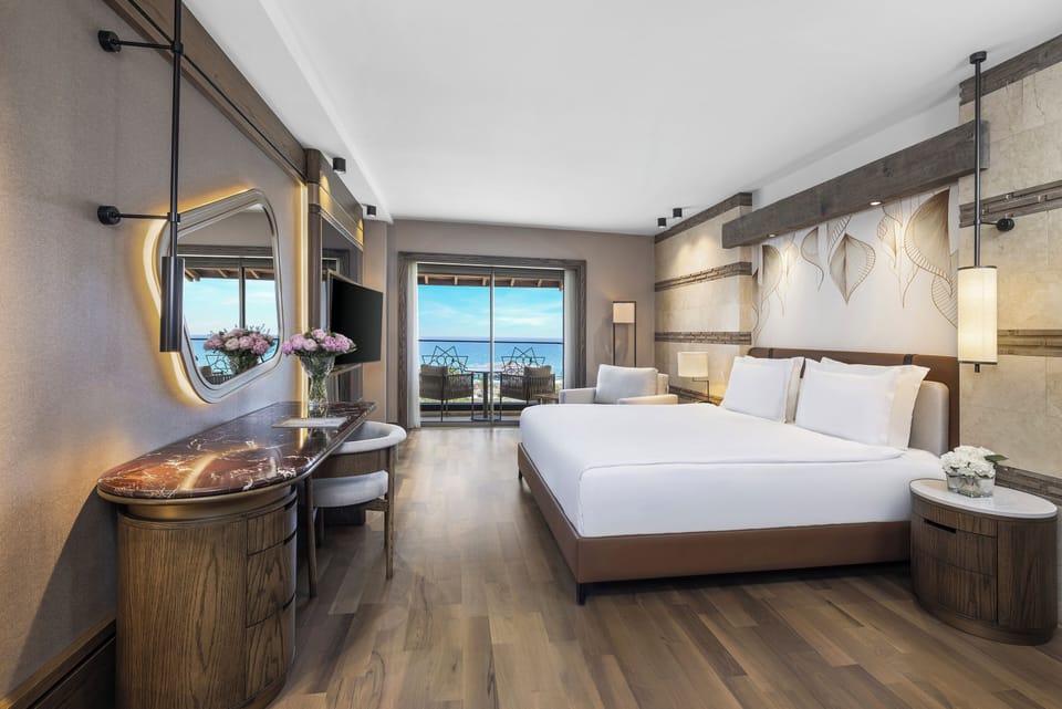Premium bedding, down comforters, free minibar, in-room safe