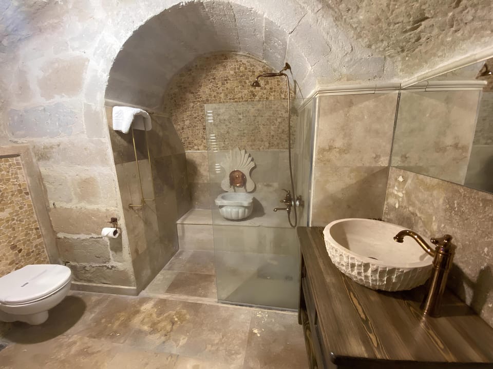 Comfort Room, Courtyard View | Bathroom | Free toiletries, hair dryer, slippers, towels