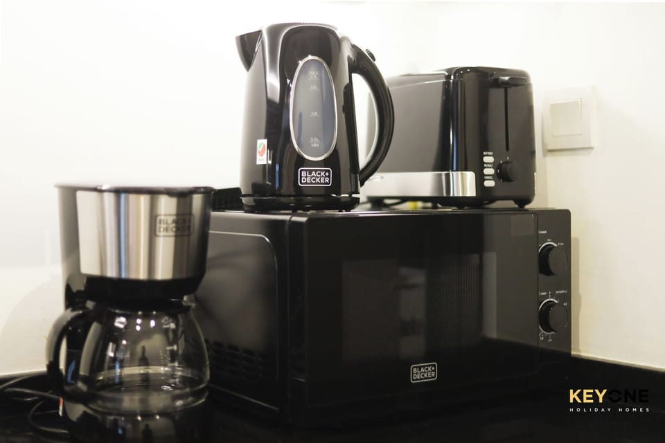 Superior Studio, Garden View | Private kitchen | Electric kettle, toaster, cleaning supplies