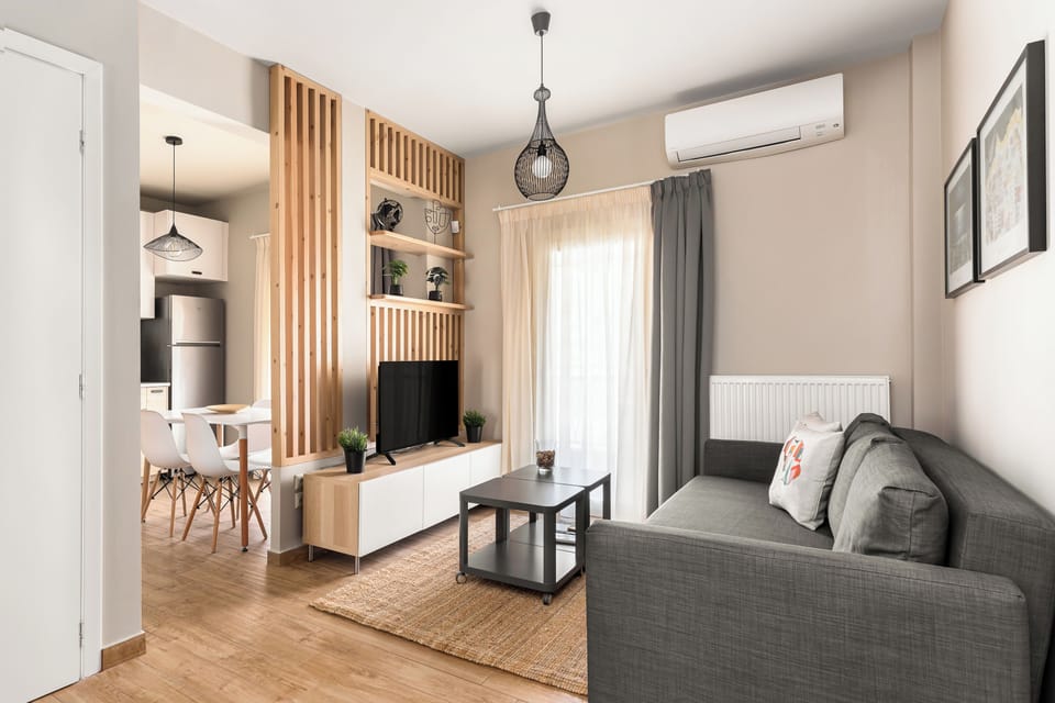 Apartment, 1 Bedroom, Balcony, City View | Living area | 40-inch flat-screen TV with digital channels