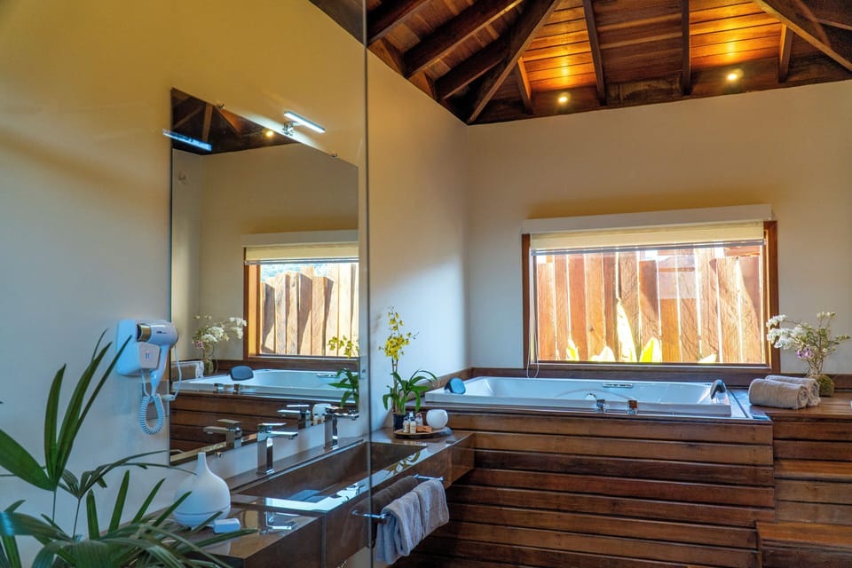 Separate tub and shower, deep soaking tub, designer toiletries