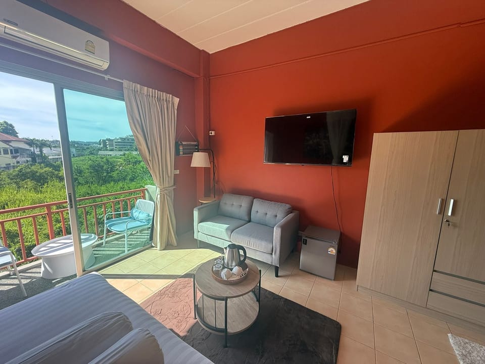 Deluxe Double Room, Balcony | Blackout drapes, iron/ironing board, free WiFi