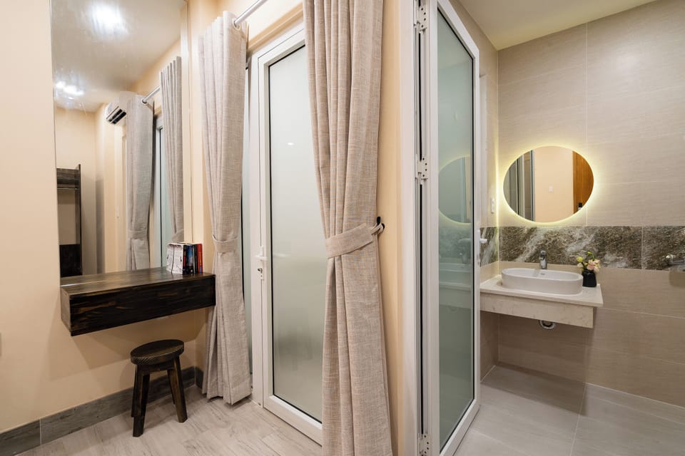 Standard Double Room | Bathroom | Shower, hair dryer, slippers, towels