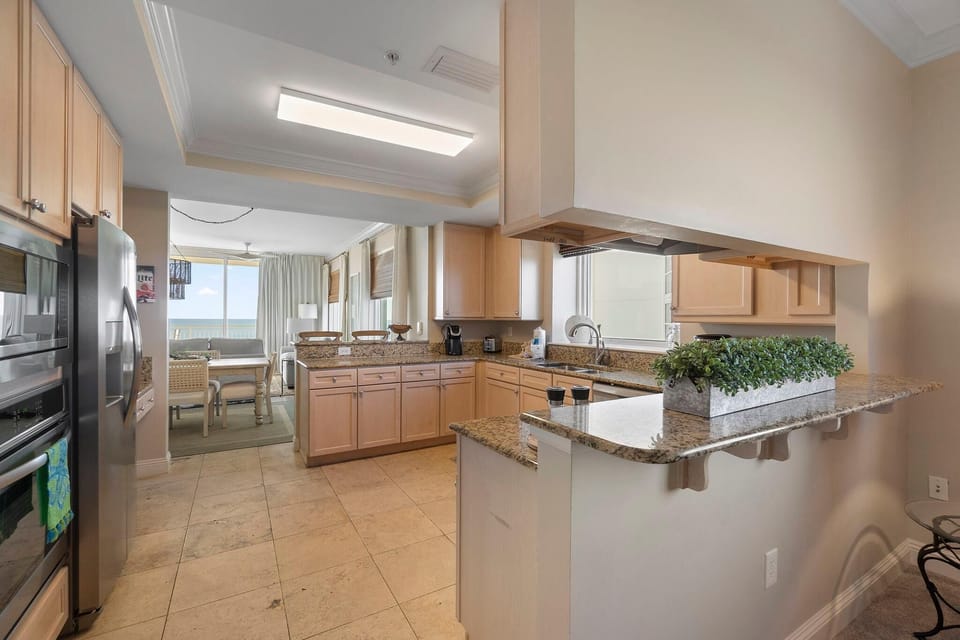 Condo, Multiple Beds (Indigo West 1404) | Private kitchen | Oven, toaster