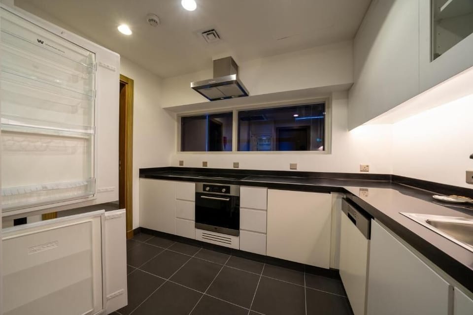 Apartment, 2 Bedrooms, Private Bathroom, City View | Private kitchen | Fridge, microwave, stovetop, dishwasher