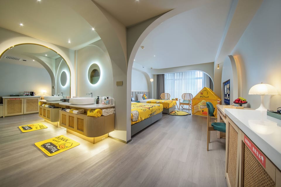 Family Triple Room, City View | Desk, laptop workspace, blackout drapes, soundproofing