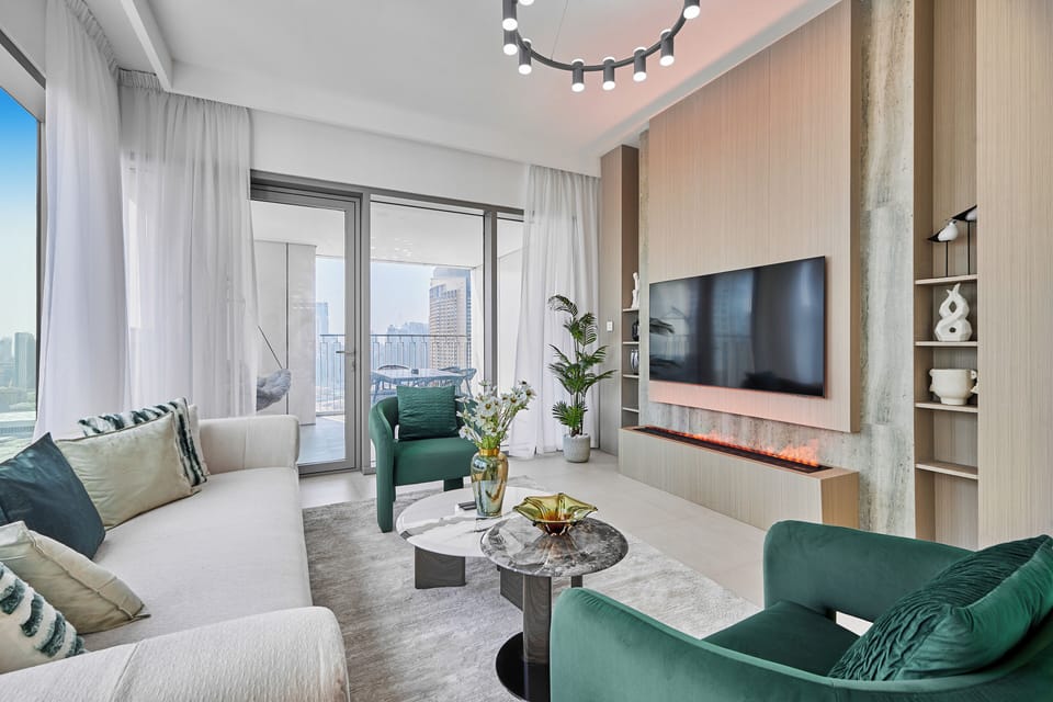 Premium Apartment, City View | Living room | 65-inch Smart TV with cable channels