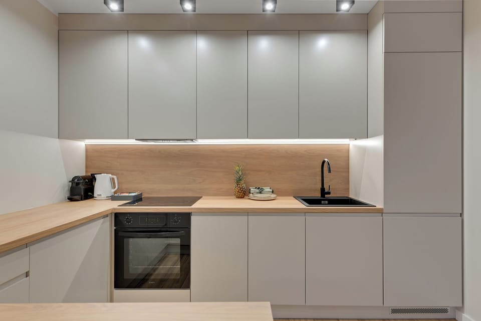 Deluxe Apartment, 2 Bedrooms, Terrace | Private kitchenette | Fridge, oven, stovetop, dishwasher
