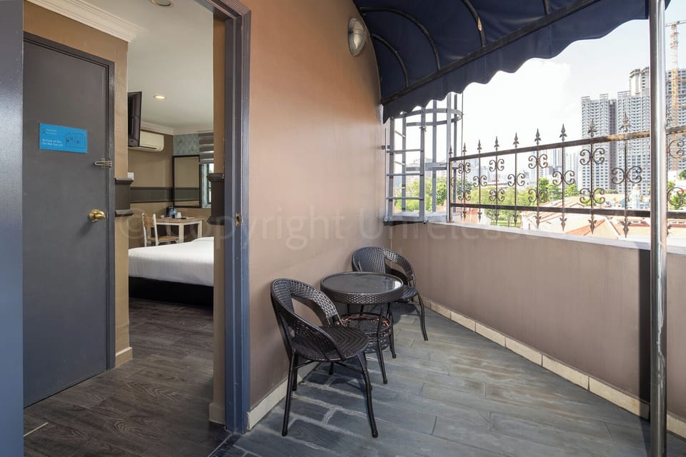 Premium Double Room, City View | Living area | 30-inch Smart TV with cable channels