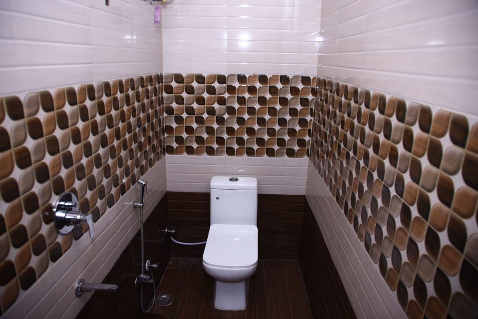 Shower, towels, soap, toilet paper