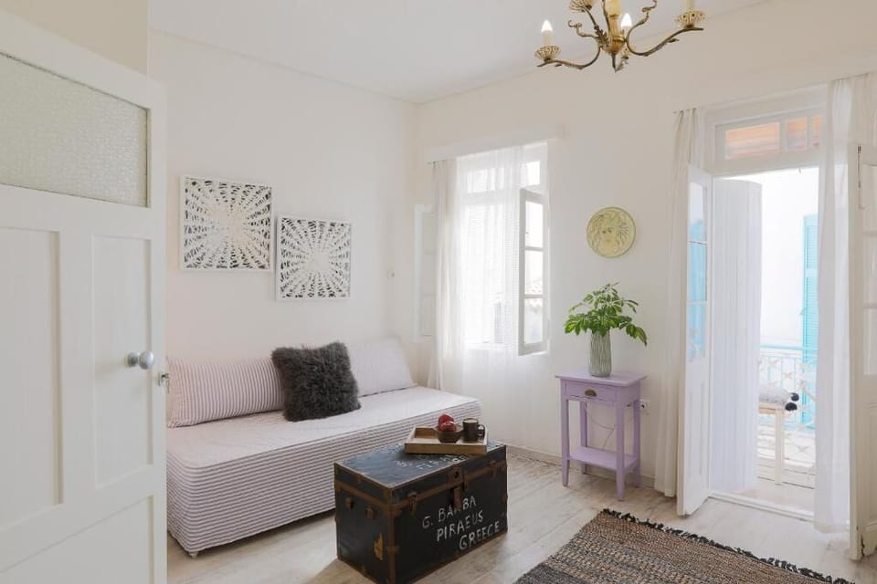 Deluxe Apartment, Balcony, City View | Living area | TV