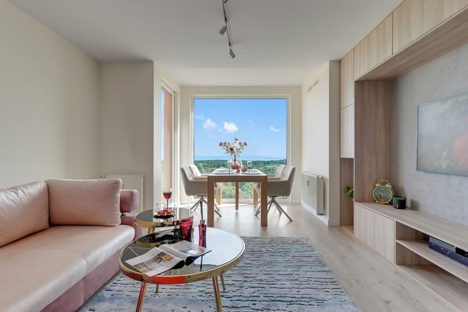 Deluxe Apartment, 1 Bedroom, Sea View | Living area | Flat-screen TV