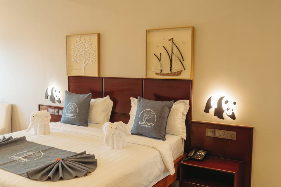Comfort Suite, Balcony, City View | In-room safe, desk, laptop workspace, blackout drapes