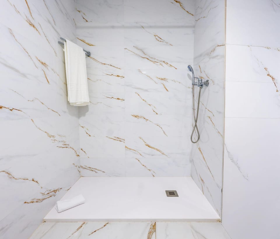 Comfort Room, City View | Bathroom | Towels, soap, shampoo, toilet paper