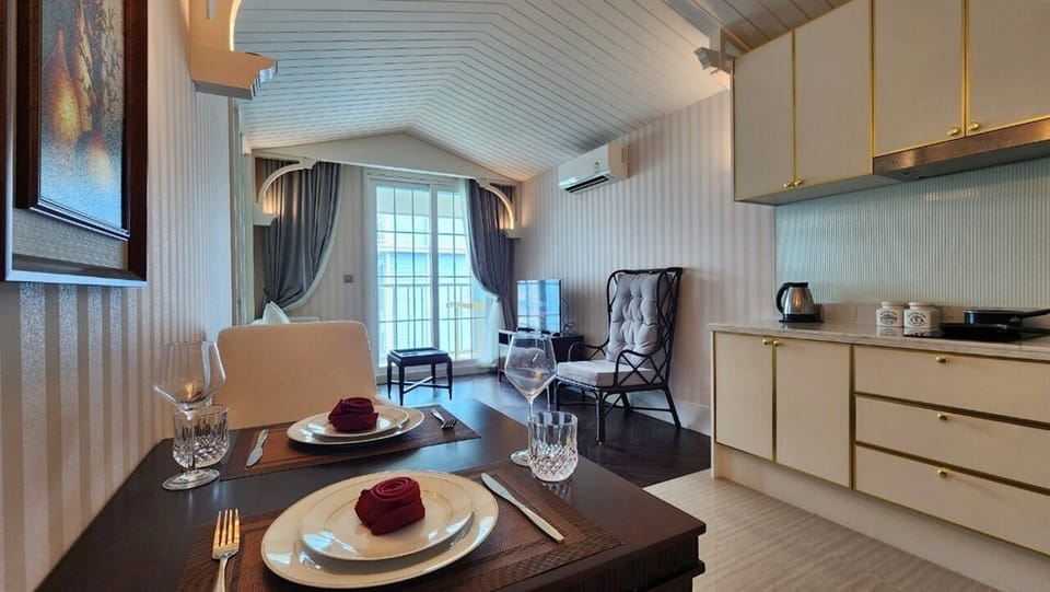 Condo, Balcony, Pool View | Private kitchenette | Full-size fridge, microwave, stovetop, electric kettle