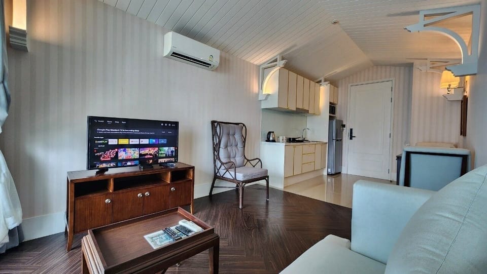 Condo, Balcony, Pool View | Living area | Flat-screen TV