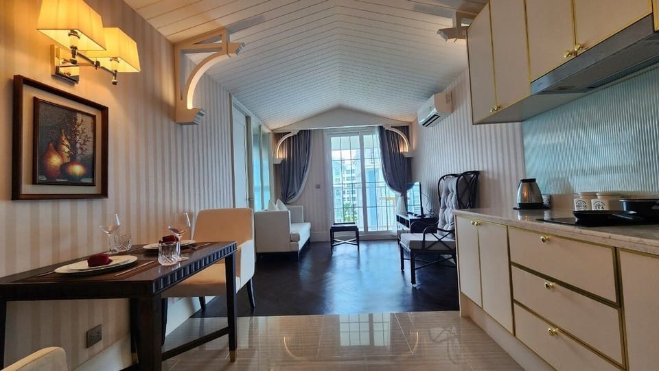 Condo, Balcony, Pool View | Private kitchenette | Full-size fridge, microwave, stovetop, electric kettle