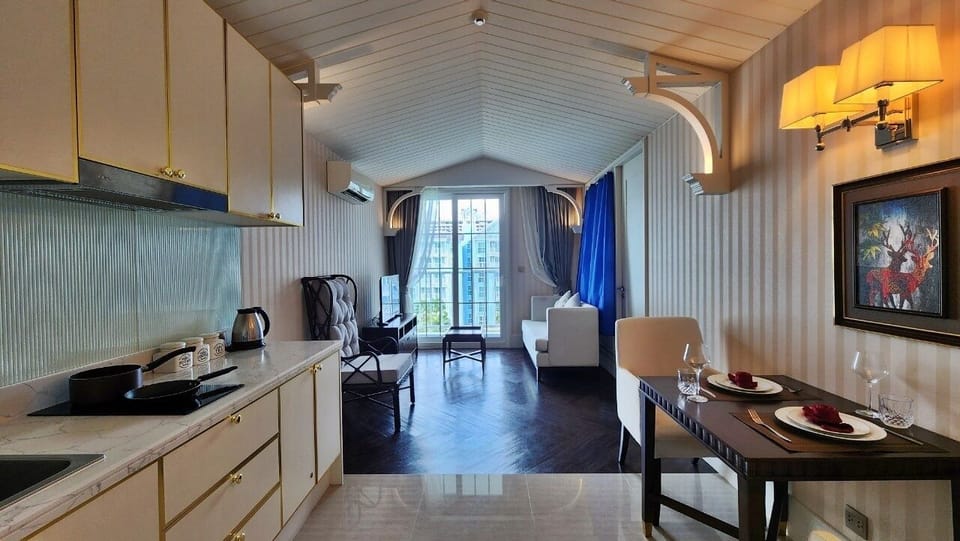 Condo, Balcony, Pool View | Private kitchenette | Full-size fridge, microwave, stovetop, electric kettle