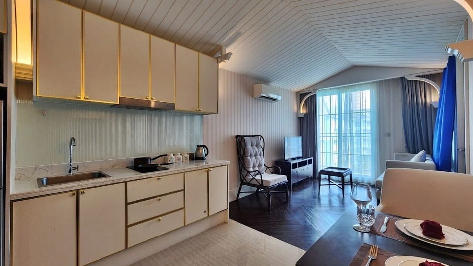 Condo, Balcony, Pool View | Private kitchenette | Full-size fridge, microwave, stovetop, electric kettle