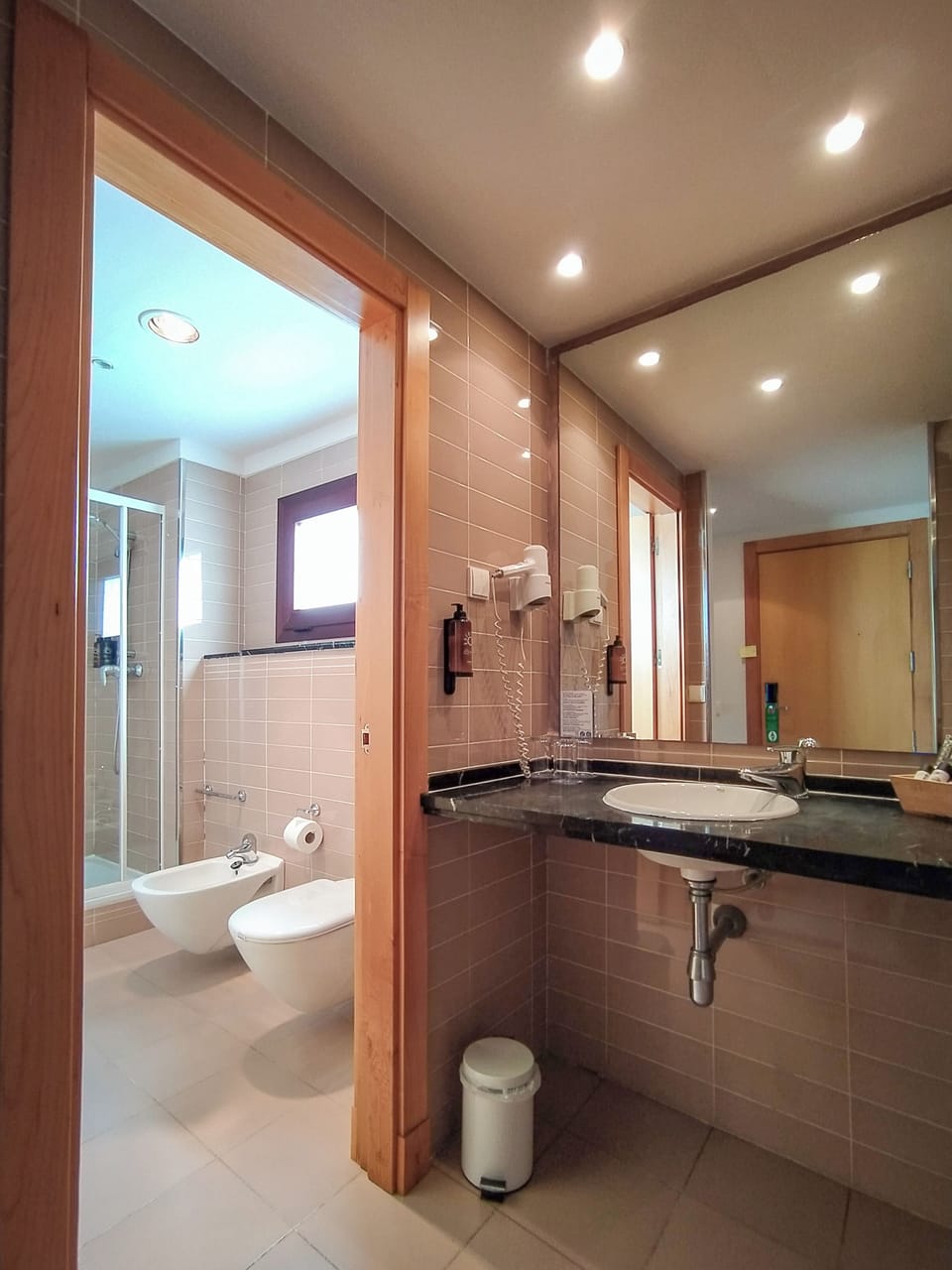 Shower, eco-friendly toiletries, hair dryer, towels