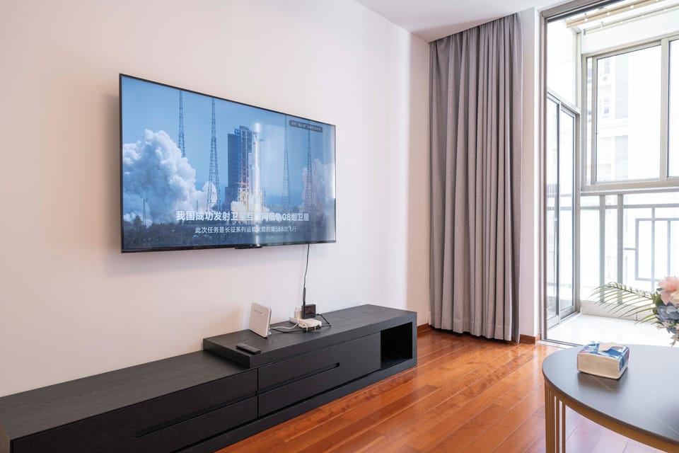 Superior Apartment, 2 Bedrooms, City View | Living room | 55-inch Smart TV with cable channels