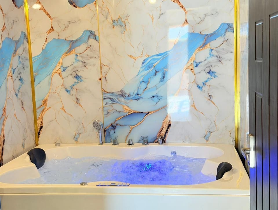 Jasmine Super deluxe Jacuzzi 2bhk | Bathroom | Towels, soap, toilet paper